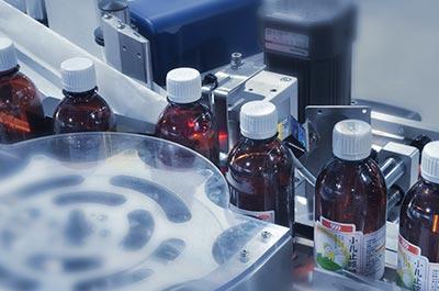 雙側面轉盤圓瓶定位貼標機故障處理