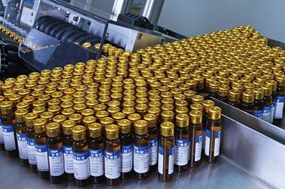 高速臥式智能貼標入托機